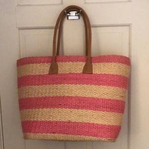 Pink and natural striped straw bag with leather like handle